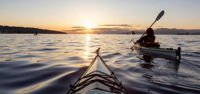 Kayaking Under the Sunset